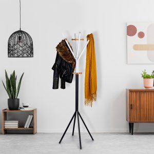 Retro, wooden cabinet and a painting in an empty living room int